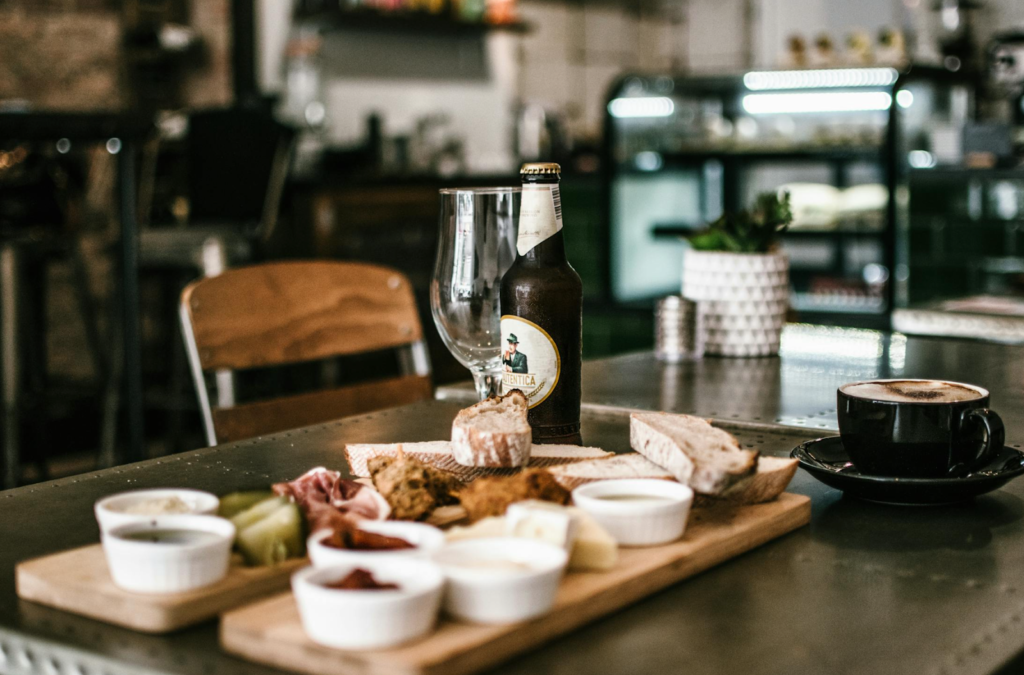 A restaurant with served food on table